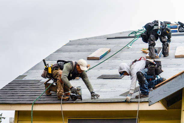 Professional Roofing technician working in Rowley, MA